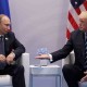 Trump Berniat Teken UU Sanksi ke Rusia