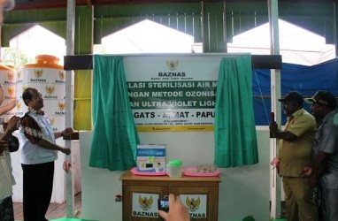 Warga Asmat Mulai Menikmati Air Bersih Murah
