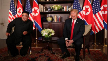 KTT AS-Korut: Trump Optimistis Sukses, Kim Jong-un Tersenyum