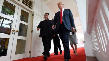 KTT AS-Korut: Begini Kata Pakar Makna Bahasa Tubuh Trump & Kim Jong-un 