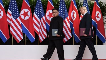 Puja-Puji Trump Usai Bertemu Kim Jong-un di Singapura