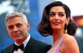 George Clooney dan Istri Donasikan Rp1,4 Miliar untuk Anak-anak Imigran