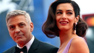 George Clooney dan Istri Donasikan Rp1,4 Miliar untuk Anak-anak Imigran