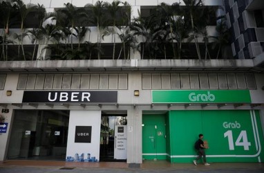 Singapura Jatuhkan Denda US$9,5 Juta ke Grab dan Uber