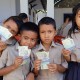 Siswa SD di Pulau Nusa, Sulut, Antusias Tukar Uang Lusuh