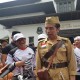 Ini Alasan Presiden Jokowi Pakai Baju Pejuang dan Bawa "Pistol"