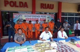 Polda Riau Gagalkan Penyelundupan 32 Kg Narkotika dan 20.000 Pil Happy Five