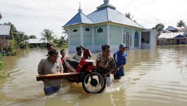 Tiga 'Payung' Aman Berkendara di Musim Penghujan