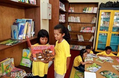 Pentingnya Membacakan Buku Pada Anak