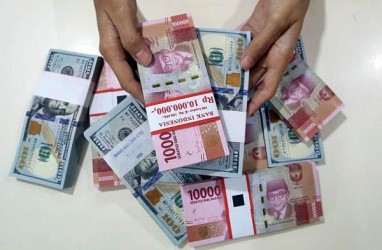 Kurs Jisdor Melemah ke 13.992, Spot Rupiah Kembali Tertekan Dolar AS