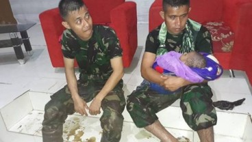 Terjepit Reruntuhan Kayu, Bayi Korban Banjir Sentani Berhasil Diselamatkan