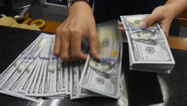 Bank Sentral Global Dovish, Dolar AS Tertahan