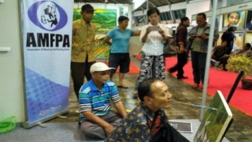 Melukis dengan Mulut dan Kaki ala Agus Yusuf