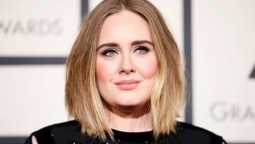 Adele Resmi Berpisah dengan Simon Konecki