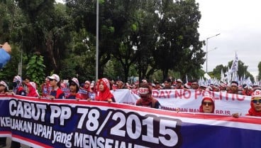 Suasana Peringatan May Day di Patung Kuda Monas