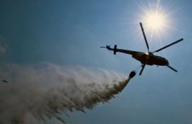Kebakaran Lahan, 18 Helikopter Gelar 15.858 Kali Pengeboman Air di Riau
