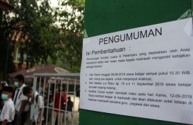 Jam Masuk Sekolah di Palembang Dimundurkan karena Kabut Asap