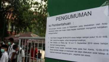 Jam Masuk Sekolah di Palembang Dimundurkan karena Kabut Asap