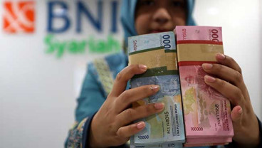 Ringkasan Perdagangan 7 Februari: IHSG Nyaris Sentuh 6.000, Rupiah Terpeleset