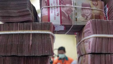 Kurs Tengah BI Melemah 30 Poin, Rupiah Masih Terbebani Virus Corona