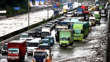 BERITA FOTO : Ketika Banjir Melumpuhkan Transportasi Ibu Kota 