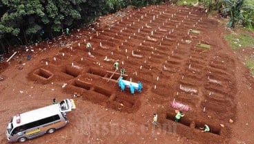 BERITA FOTO : Korban Meninggal Akibat Covid-19 Terus Bertambah, Begini Prosesi Pemakamannya