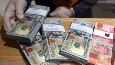 Kurs Jisdor Menguat ke 15.567, Rupiah Masih Tertekan di Pasar Spot