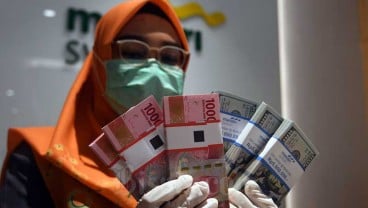 Kurs Jisdor Melemah ke Rp15.591, Rupiah Melemah di Pasar Spot