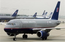 United Airlines Larang Penumpang Terbang Tanpa Masker 