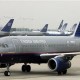 United Airlines Larang Penumpang Terbang Tanpa Masker 