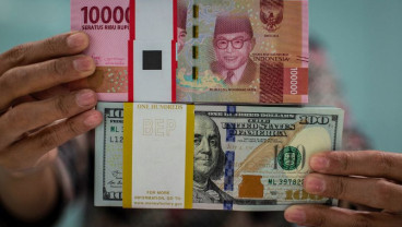 NILAI TUKAR : Rupiah dan IHSG Tak Sejalan