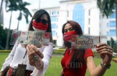 Rupiah Menutup Kuartal III di Zona Hijau, tapi Terlemah di Asia