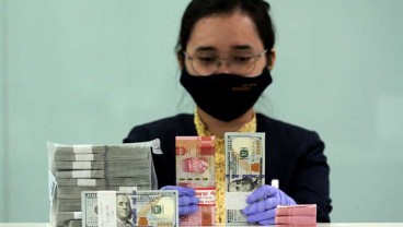  PENUNDAAN PEMBICARAAN STIMULUS AS   : Dolar Lunglai, Rupiah Berjaya