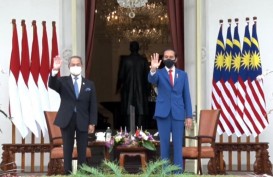 Tamu Negara Pertama 2021, Jokowi Sambut PM Muhyiddin di Istana Merdeka