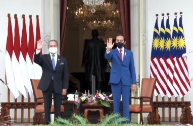 Bertemu PM Muhyiddin Yassin, Jokowi Tekankan Perlindungan PMI di Malaysia