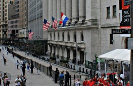 The Fed Pertahankan Suku Bunga Rendah, Wall Street Menguat