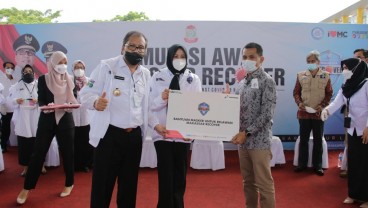 Dukung Program Makassar Recover, Pertamina Berikan Bantuan Ribuan Masker untuk Relawan 