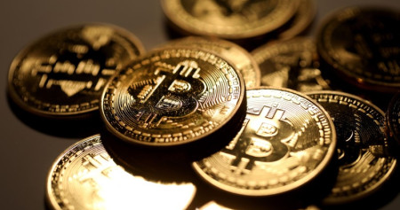 Ilustrasi Bitcoin. Aset cryptocurrency terbesar ini menembus level US$23.000 untuk pertama kalinya pada Kamis (17/12/2020)./Bloomberg