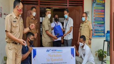 WOM Finance Salurkan CSR untuk Duafa di Sumsel Tekan Dampak Covid-19