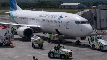 Beda Cara Garuda (GIAA) dan AirAsia Jaga Napas saat Paceklik