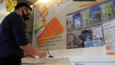 Danamon (BDMN) Gandeng Grab Rilis Kartu Kredit buat Milenial