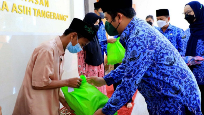 HUT Korpri ke-50 Tahun, Pemkot Tangerang Berikan Santunan Ribuan Paket Sembako