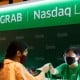 Saham Grab Ambles usai IPO, Bakal Senasib dengan Saudara Jauhnya (BUKA)?