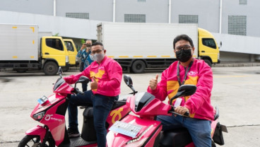 KONVERSI KENDARAAN RODA DUA : Berebut Kue Motor Listrik