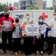 JNE Salurkan Bantuan Ambulans untuk Pemkab Karawang