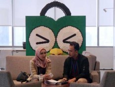 Cara Tokopedia dan Grab Genjot Produktivitas Mitra