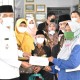 Ratusan Petugas Kebersihan Terima Zakat dari Baznas OKI 