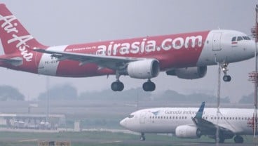 Adu Cepat Garuda Indonesia (GIAA) dan AirAsia (CMPP) Tanggalkan Notasi Khusus