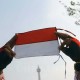 Cek Fakta: Bendera Merah Putih Diturunkan Paksa dan Dibakar di Jayawijaya