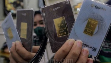 Harga Emas Menguat saat Dolar AS Melemah, Terhambat Data Tenaga Kerja